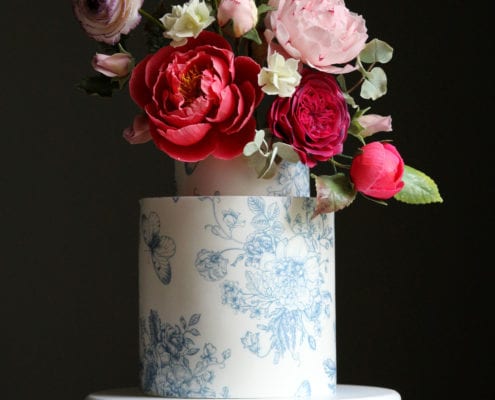 Vibrant sugar flower wedding cake Cove Cake Design