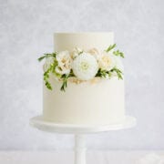 Ganache cake with edible flowers Cove Cake Design