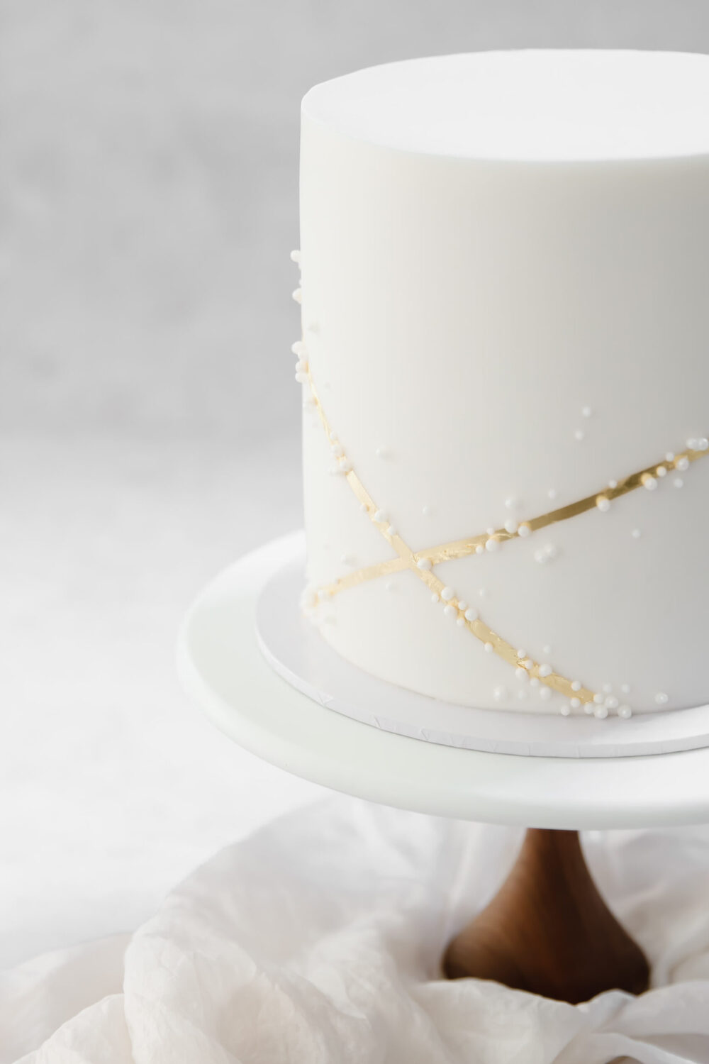 Gold and Pearl Wedding Cake Cove Cake Design