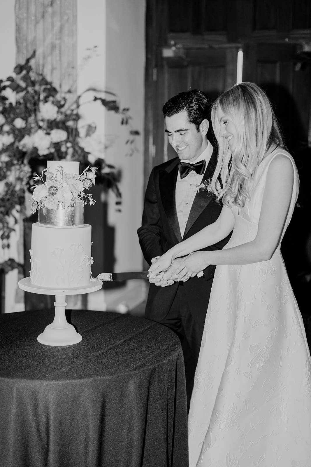 Couple Cutting Wedding Cake