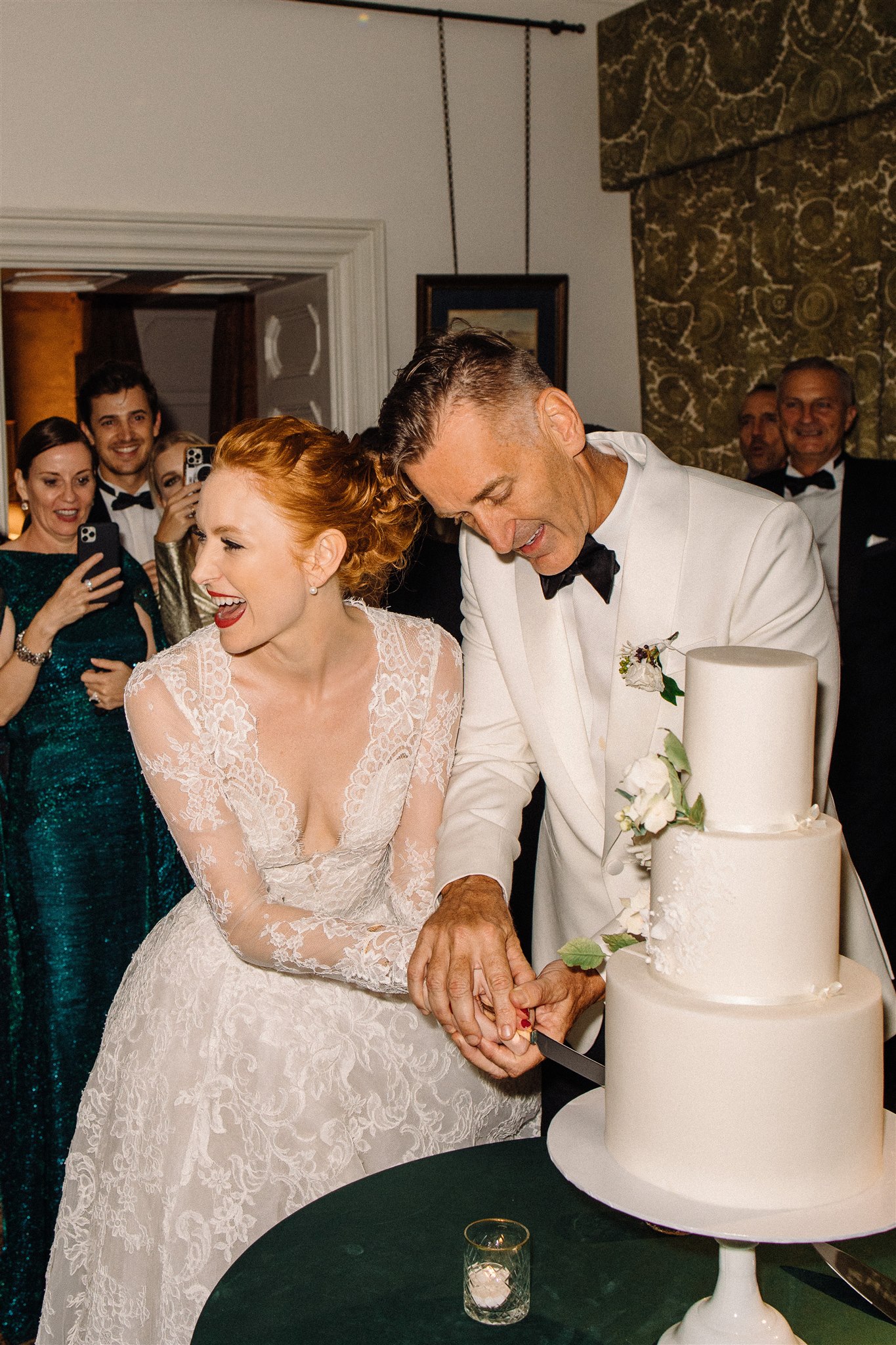 Bride and groom cutting the cake