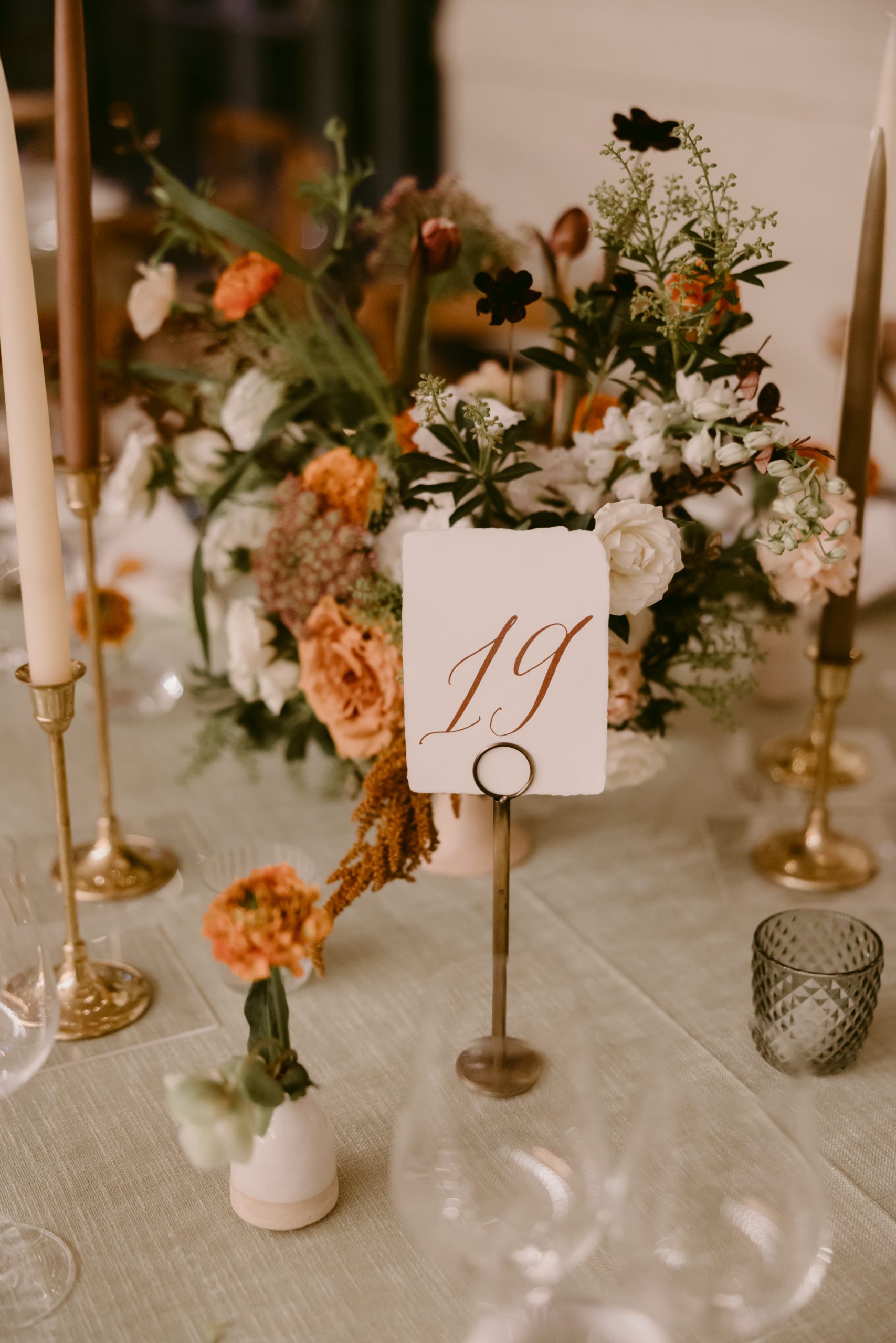 Wedding table numbers and flowers
