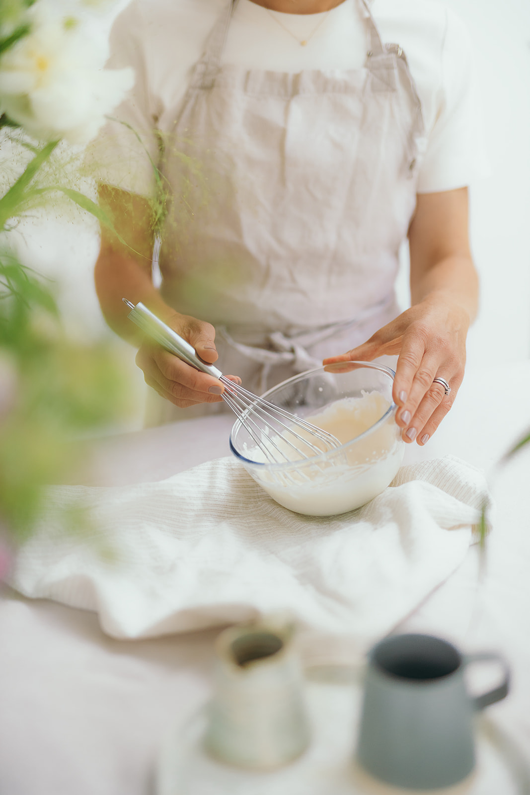 Baker mixing bowl of cream