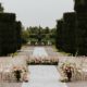 Outdoor wedding set up with beautiful aisle florals
