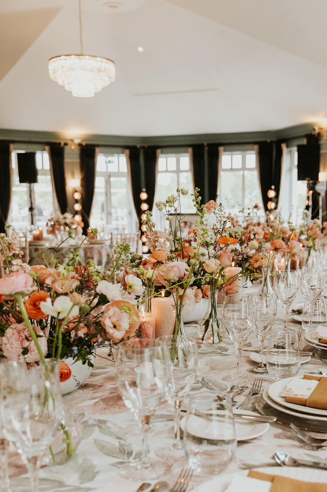 Wedding reception place settings with floral theme